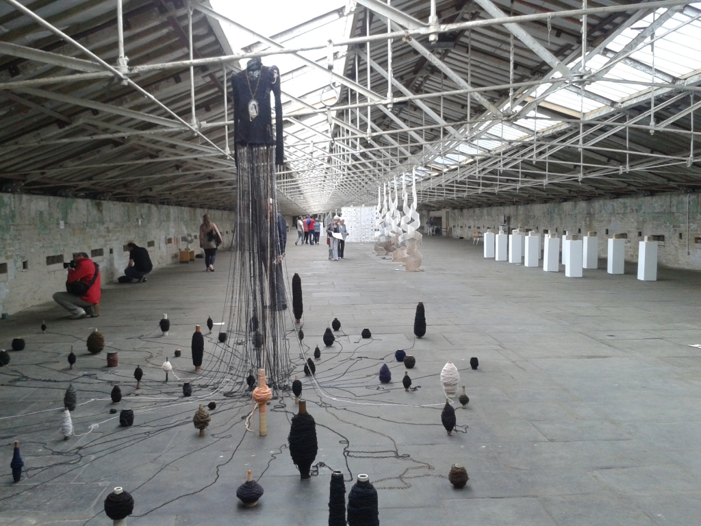 Cloth and memory: a moving artwork exhibition in a disused mill