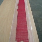 My husband's favourite. German artist Katharina Hinsberg used a single red thread and ran it round the perimeter of the Spinning Room. Then she wove the thread into an exact floor plan at the ratio of 1:100. It was still a massive piece of work, reflecting the size of the room